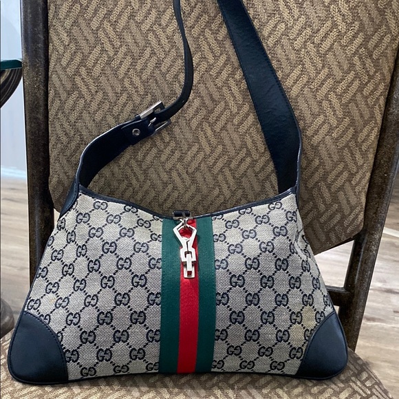 Brown and Black Shoulder Bag with Iconic Design - Picture 2 of 12